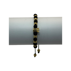 Pulsera tejida neopreno balines y corona con zircones negros dorada