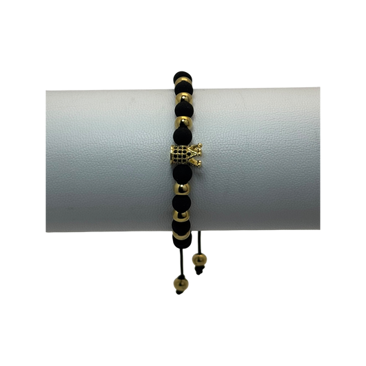 Pulsera tejida neopreno balines y corona con zircones negros dorada