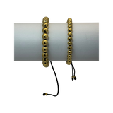 2x Pulsera tejida balines dorados